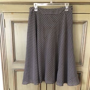 Dark brown and off-white knee length skirt.